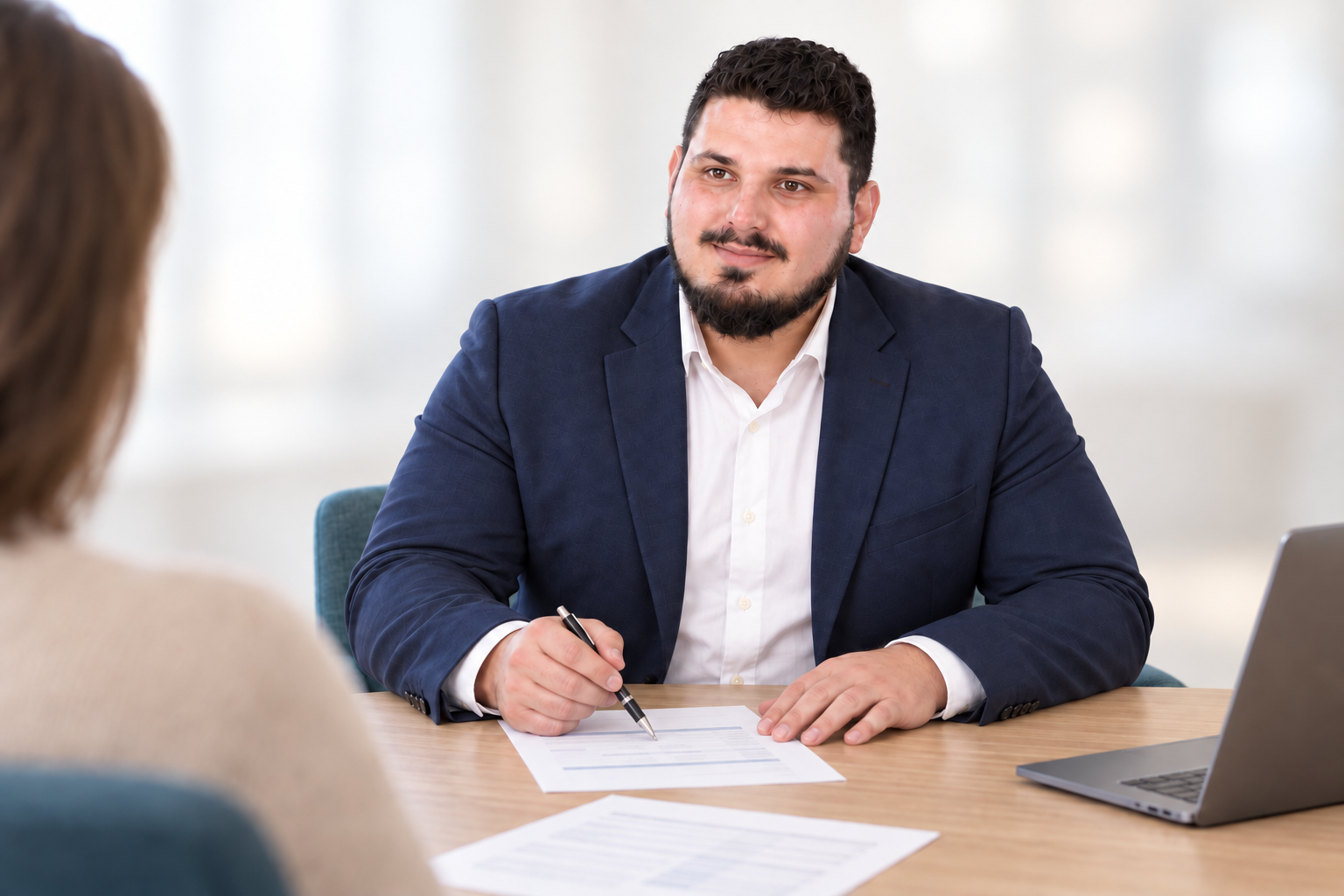 Arber Kastrati in a personal meeting at the table